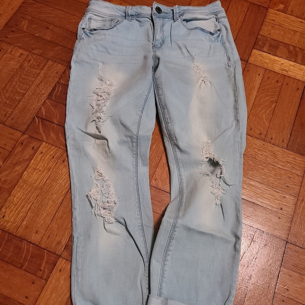 Light blue ripped jeans